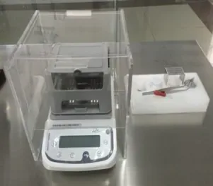 Density tester for die cast parts